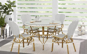 White wicker outdoor cafe table