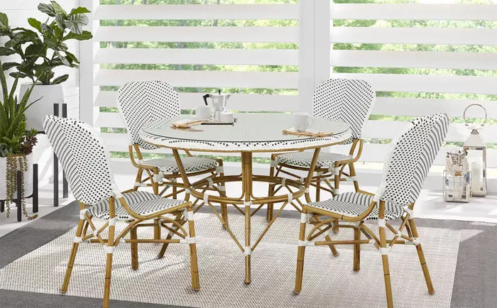 White wicker outdoor café table set