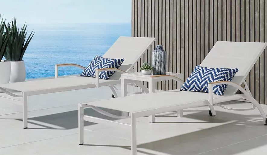 white metal chaise lounge chairs