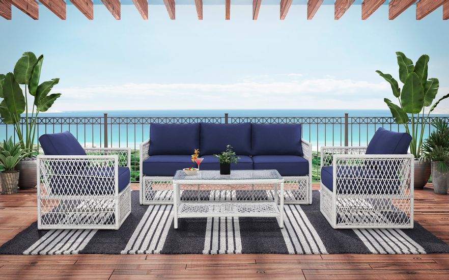 Photo of Blue and Tan Seating Set on Partially Covered Porch