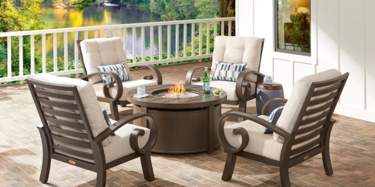 Photo of metal patio seating set and fire pit table