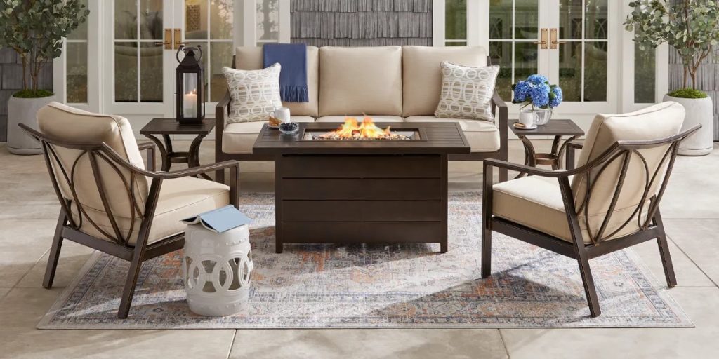 Bronze outdoor fire pit seating set with pillows
