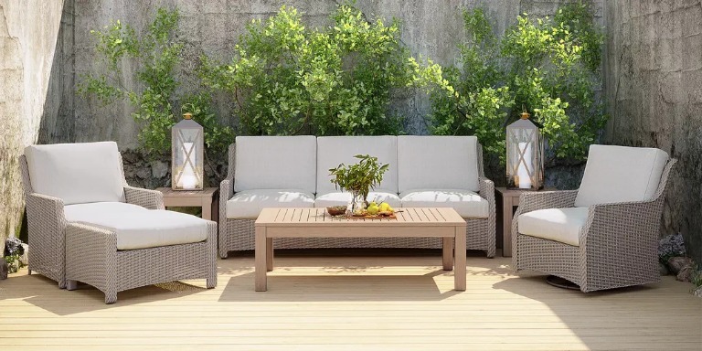 Gray wicker and teak outdoor seating set