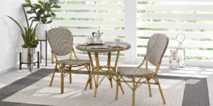 Image of a 3 piece dining set next to a slatted wind block