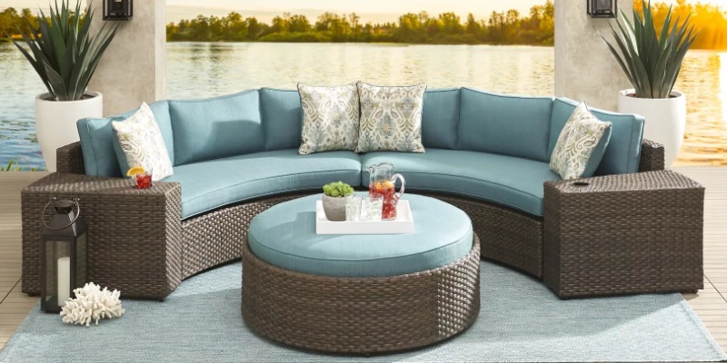 Rialto brown curved wicker sectional with blue cushions