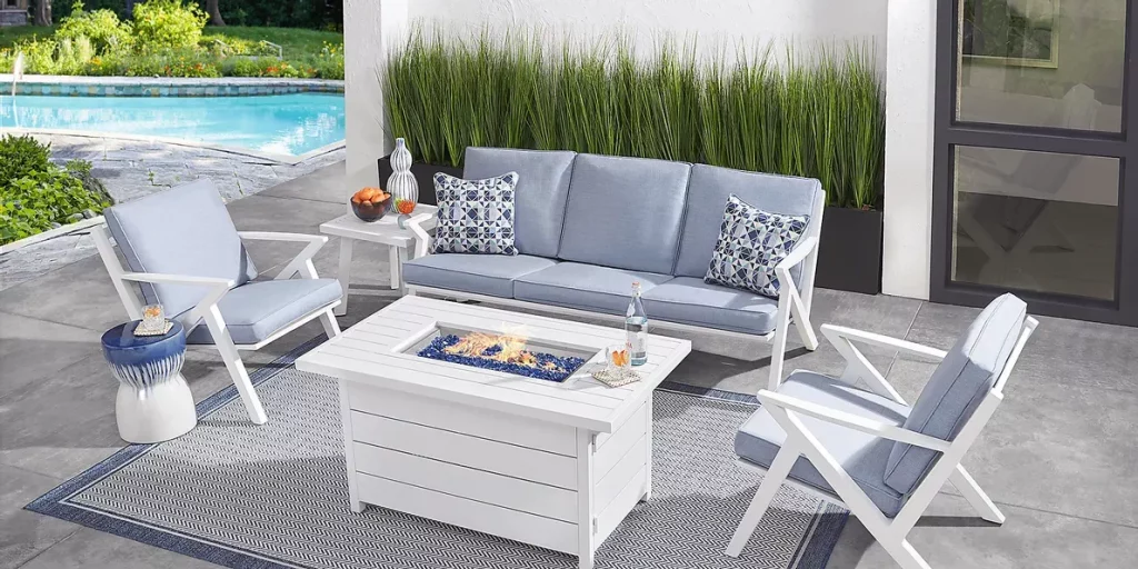 White and blue patio seating set with fire table